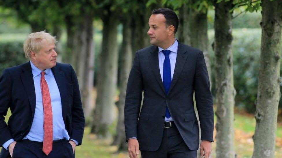 Boris Johnson and Leo Varadkar walking in the grounds of Thornton Manor