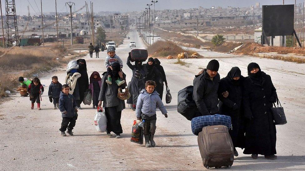 Displaced Syrian families arrive in the government-held eastern district of Jabal Badro, Aleppo (29 November 2016)