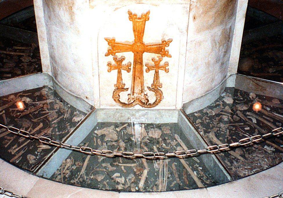 Human bones in a pit within the church