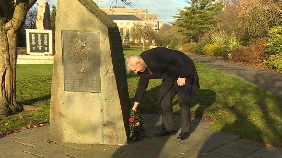 First Minister Carwyn Jones laid a wreath at the memorial which was installed in Cardiff's civic centre in 1992