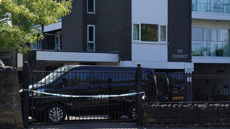 Police tape outside a block of flats in Lucknow Road, Nottingham