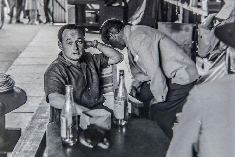 Donald Campbell sitting in a chair and looking straight at the camera