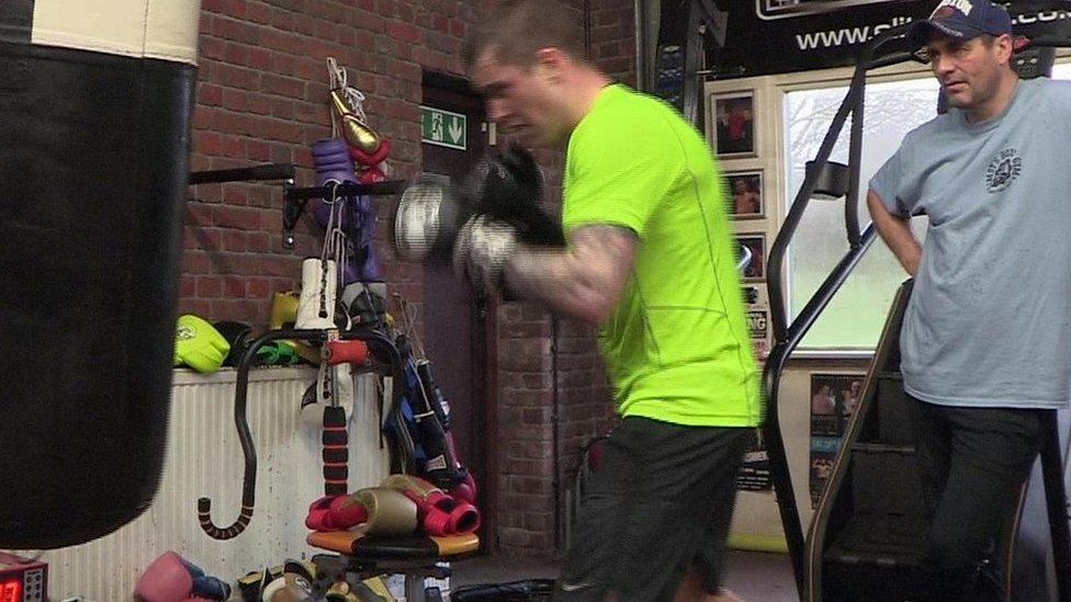 Tony Sims watches Ricky Burns train