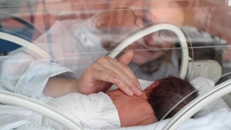 Baby in incubator