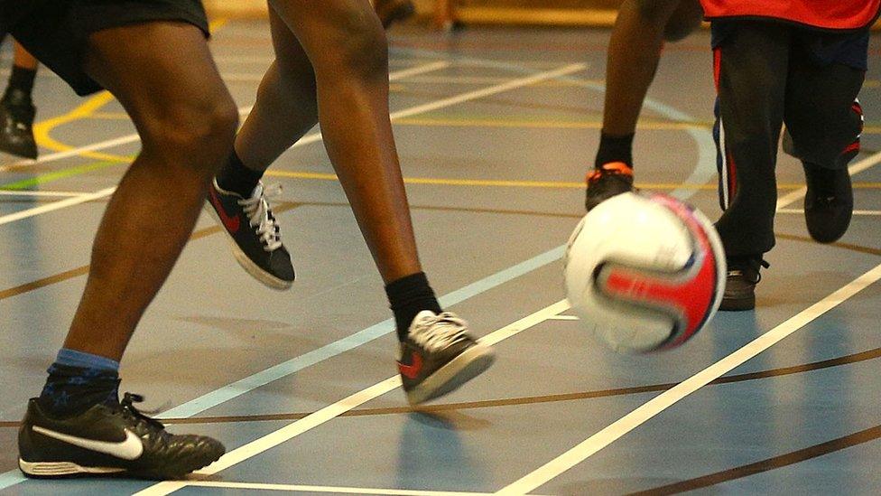 Boys playing football