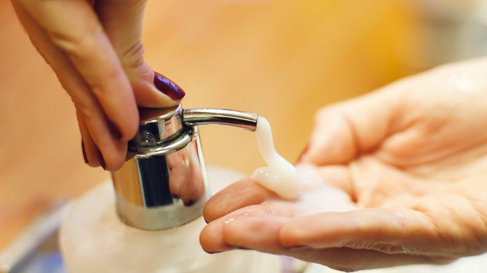 Person washing hands