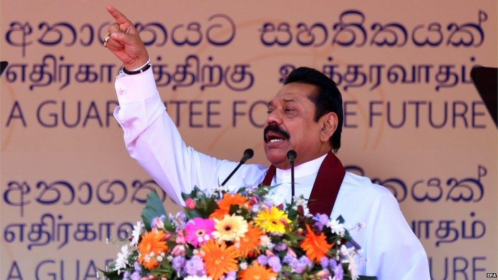 Former Sri Lankan President Mahinda Rajapaksa speaks to supporters during an event to release the United People"s Freedom Alliance election manifesto for the upcoming general elections with the theme "A Guarantee for the Future" at a ceremony held at the Edward Henry Pedris Grounds in Colombo, Sri Lanka, 28 July 2015.