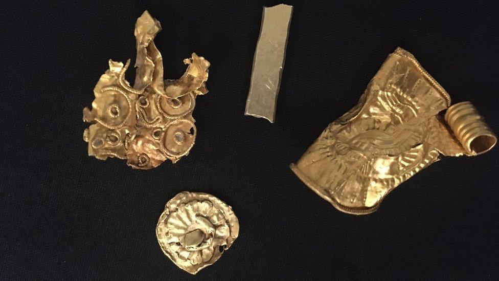 Gold items found with Anglo-Saxon coin hoard