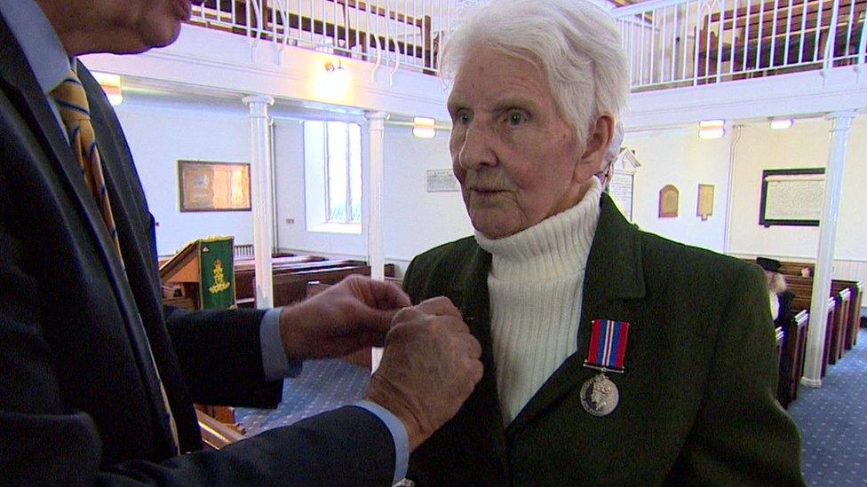 Nelly Hassell with medals