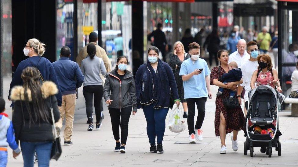 Shoppers wearing face masks