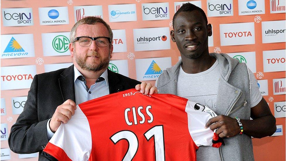 Senegalese defender Saliou Ciss (R) as a new recruit in 2013 for Valenciennes football club's (VAFC)