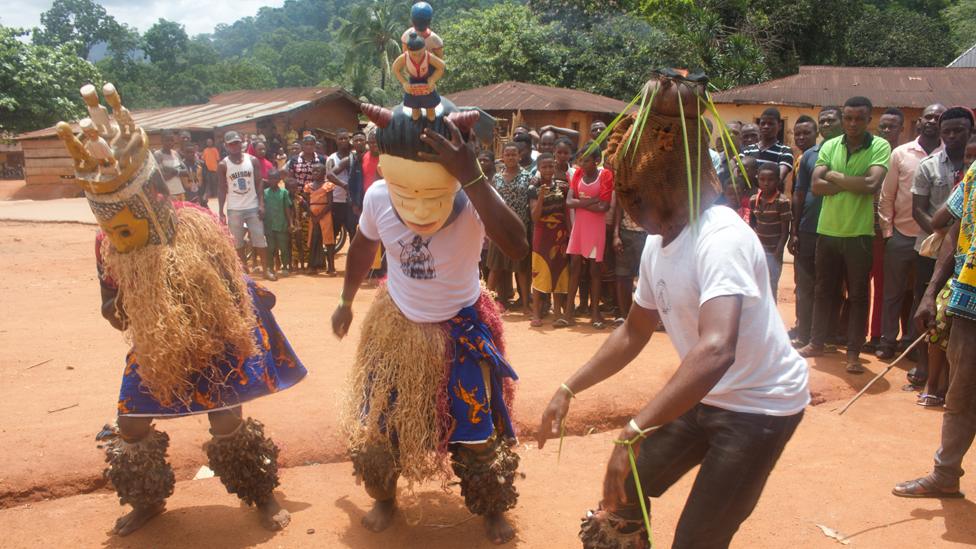 Masked men in Ubang performing in a masquerade