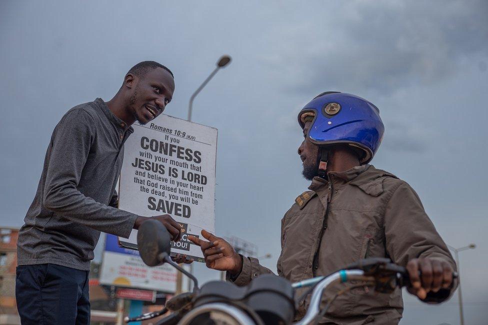 Man talking to a passer-by