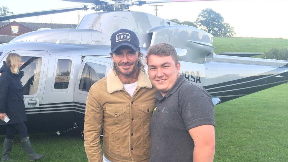 David Beckham with fan Harri Matthews by the chopper