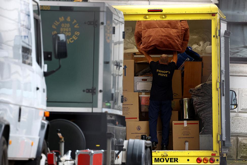 A worker loads a removal van following the appointment of Rishi Sunak as prime minister on 25 October 2022