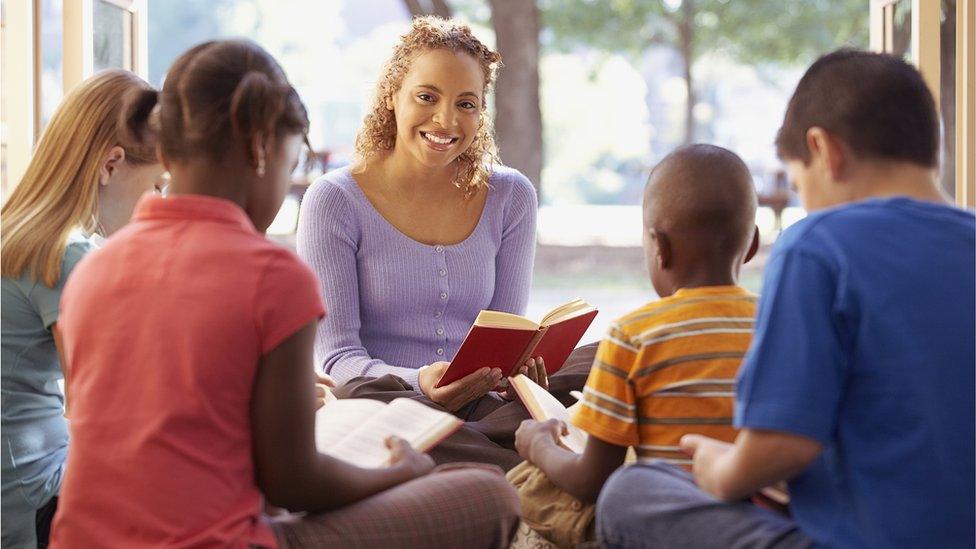 teacher reading to class