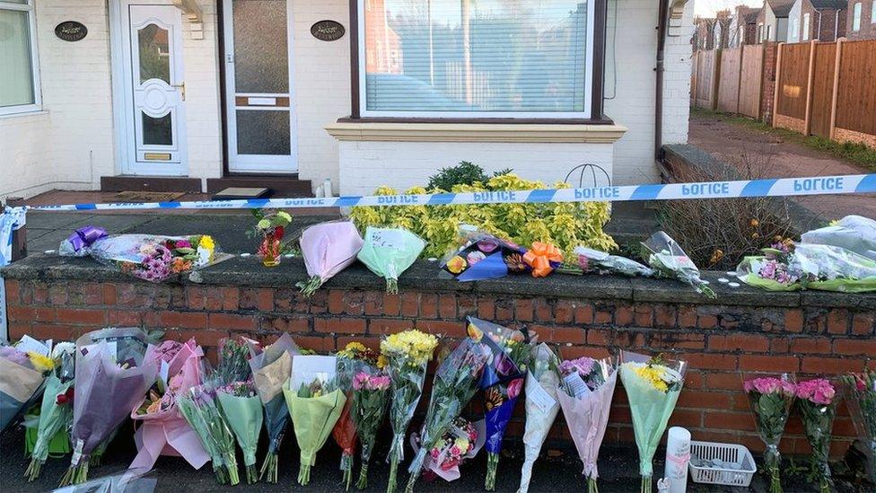 Flowers outside house in Station Road