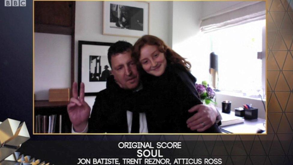 Atticus Ross with his daughter