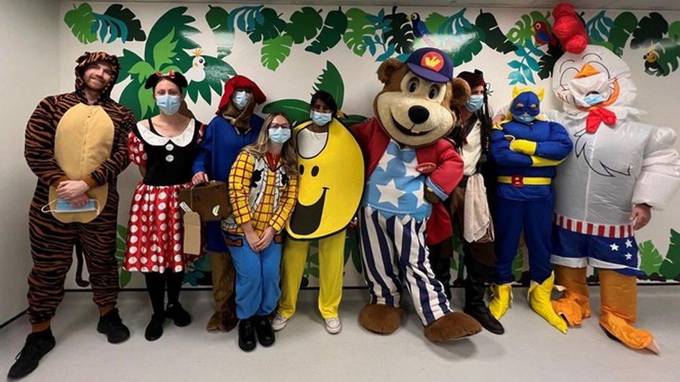 Toy character mascots attend the opening of the children's casualty department at James Paget Hospital