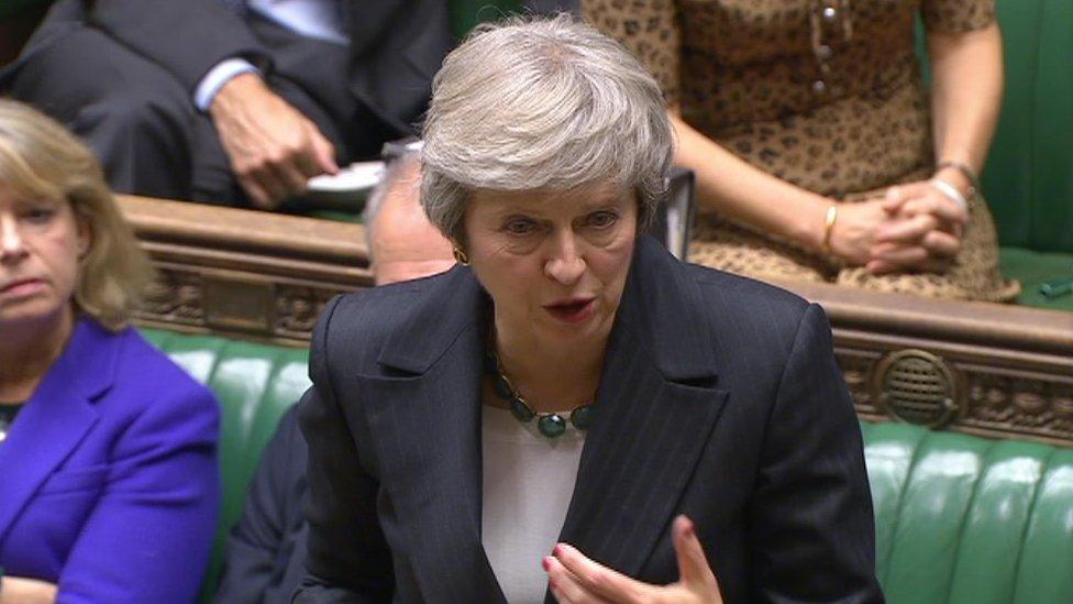 Theresa May defends the draft Brexit deal in the Commons