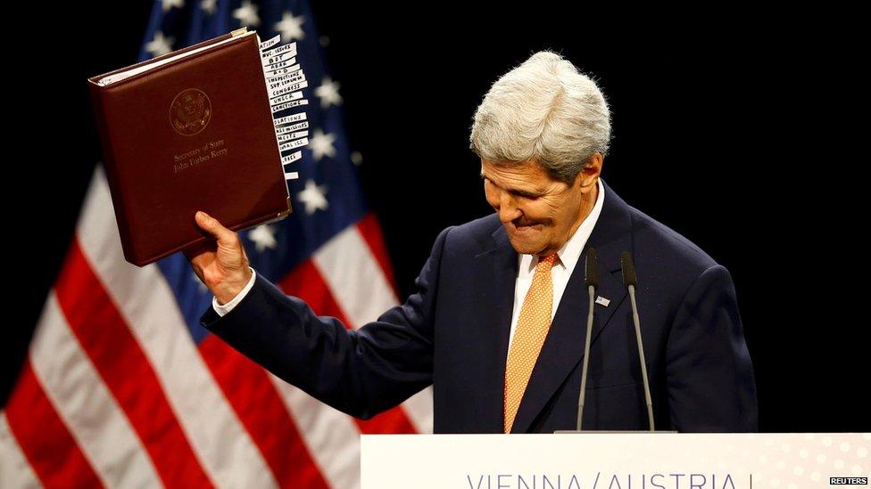 US Secretary of State John Kerry reacts as he delivers a statement on the Iran talks deal at the Vienna International Center in Vienna, Austria July 14, 2015.