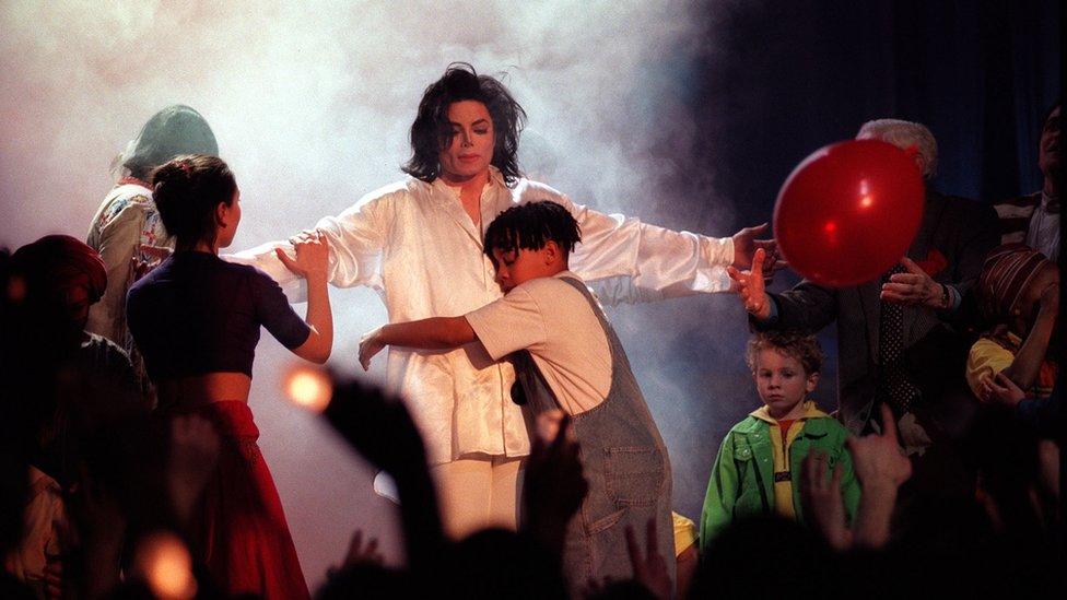 Michael Jackson performing Earth Song on stage, Brit awards 1996