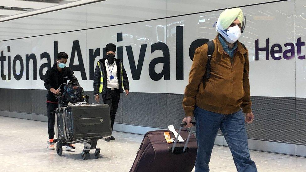 Passengers from red list countries being escorted from Terminal 5