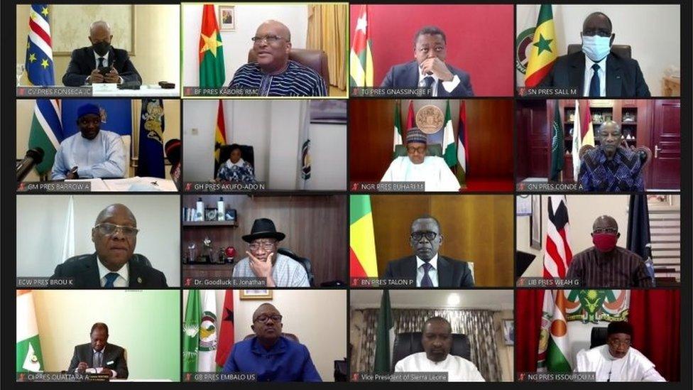 A screenshot shows a teleconference during the extraordinary Summit of the Economic Community of West African States (ECOWAS) Authority of Heads of State and Government on the Socio-Political Situation in Mali August 20, 2020.