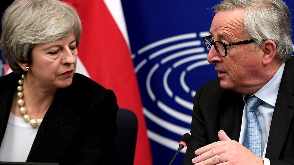 theresa may and jean-claude juncker