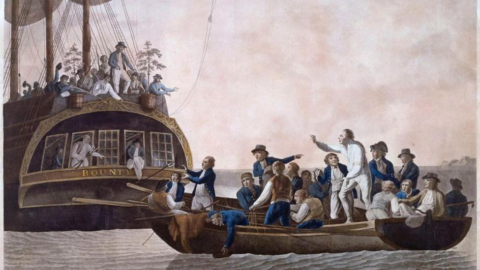 A painting depicting the historical mutiny of HMS Bounty. Men can be seen adrift on a small boat while others can be seen looking down at them from HMS Bounty.
