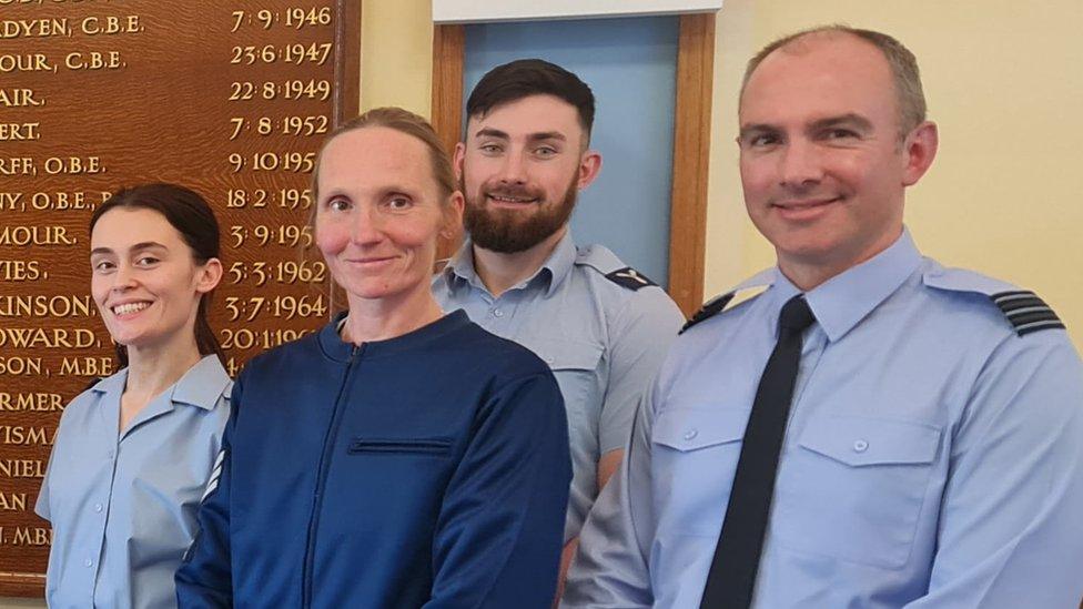 Charlotte and Mel with station commander Wing Cdr Neil Hallett (right)