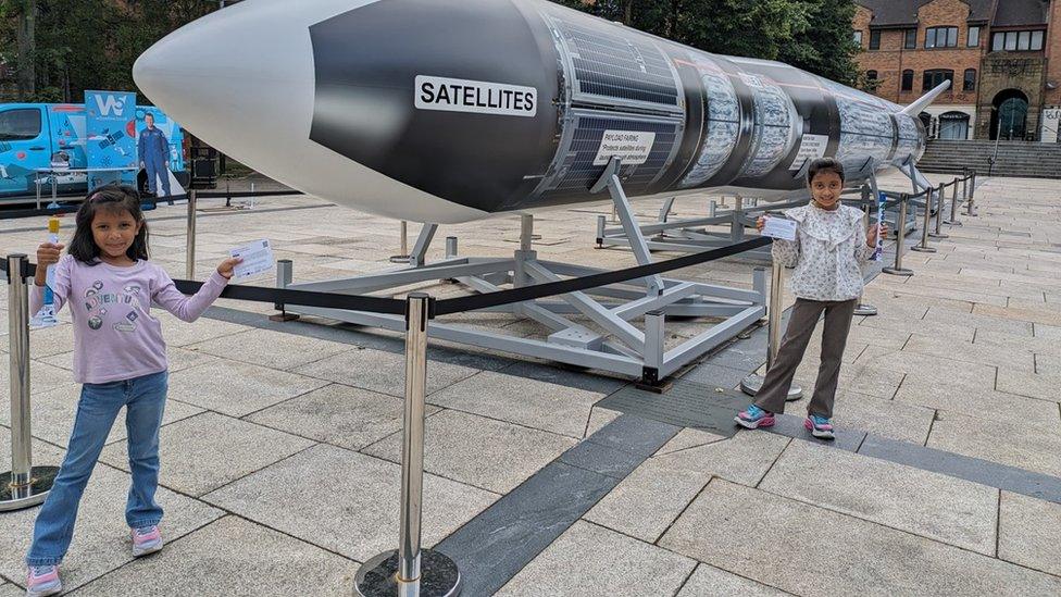 Zoya and Ayla Yazdani with the model rocket