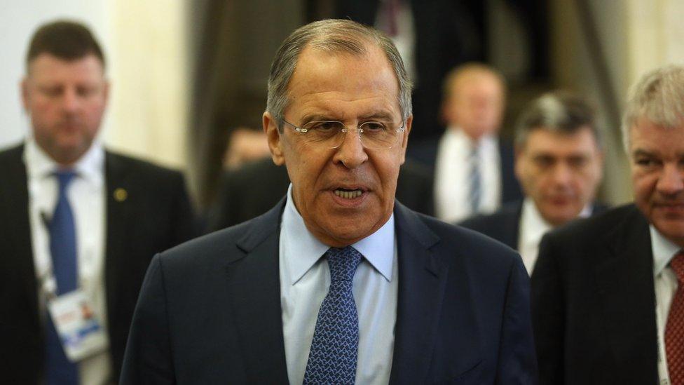 Sergei Lavrov arriving at a meeting