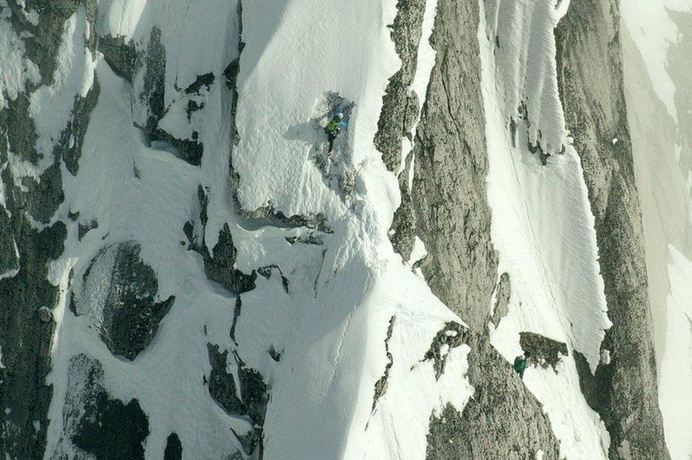 Jon Bracey climbing up the mountain