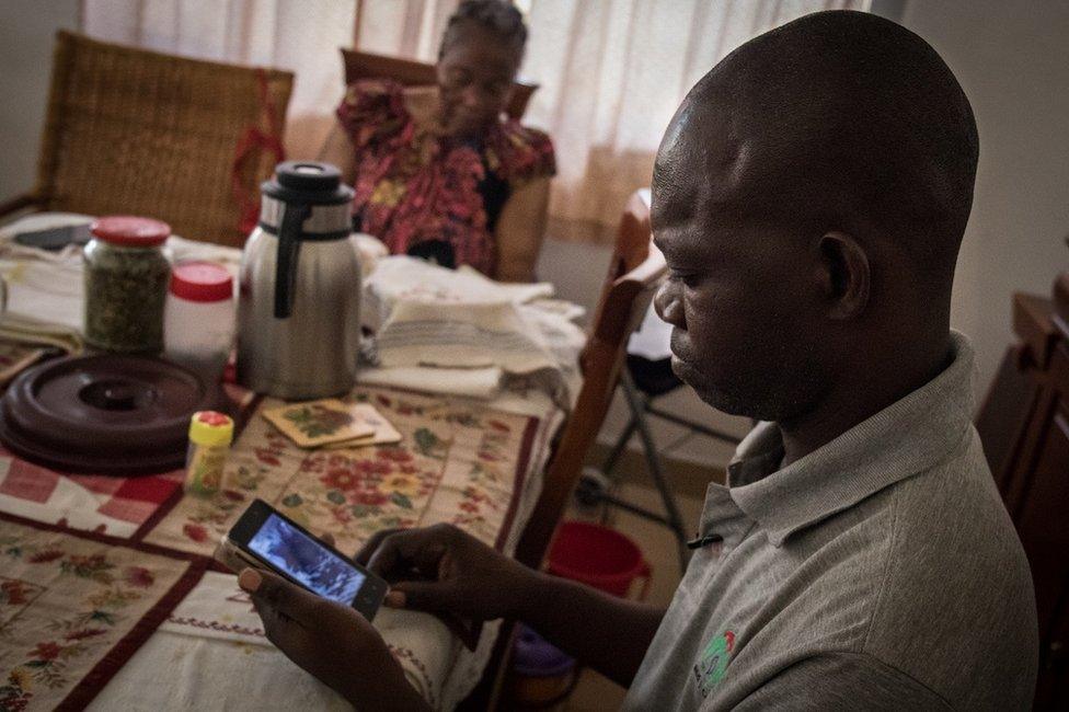 Man looking at a phone