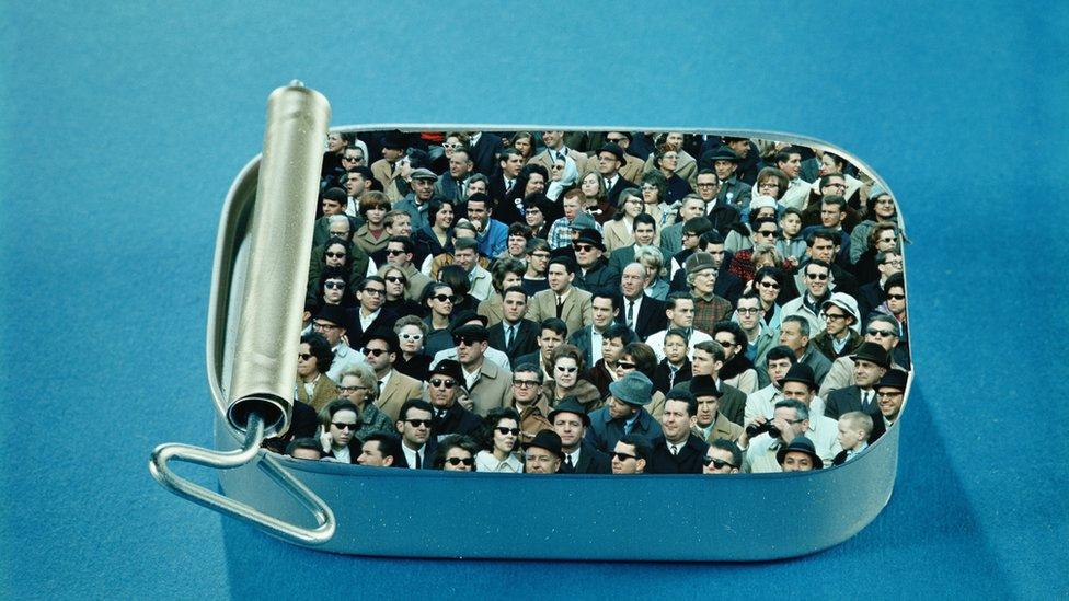 people in a sardine tin