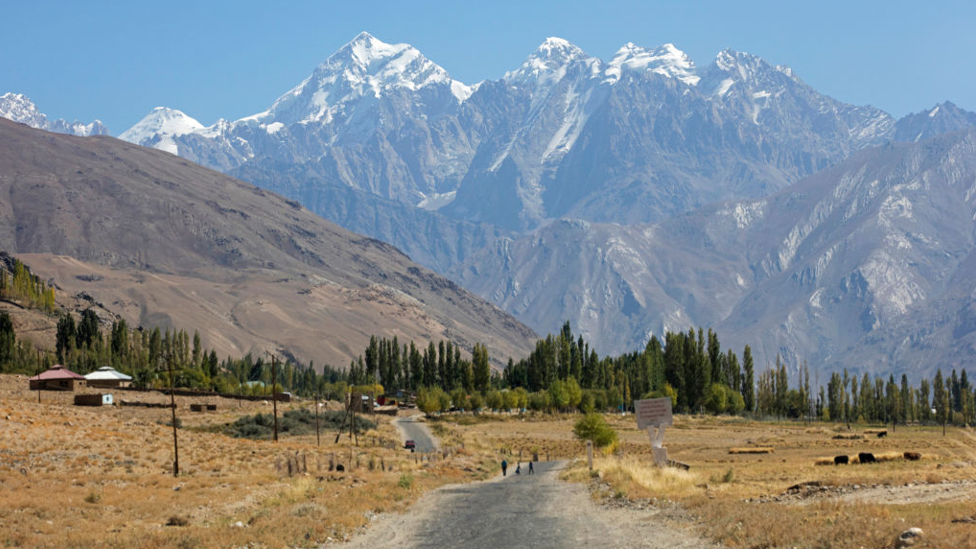 Snow covered mountain peaks of the Pamir Mountains and the Pamir Highway in the Gorno-Badakhshan province, Tajikistan