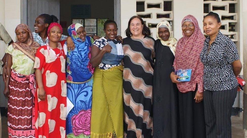 Caroline Coster (fourth from right), pictured in 2018 with women she had helped become mentors for business start-ups in Utange, Mombassa