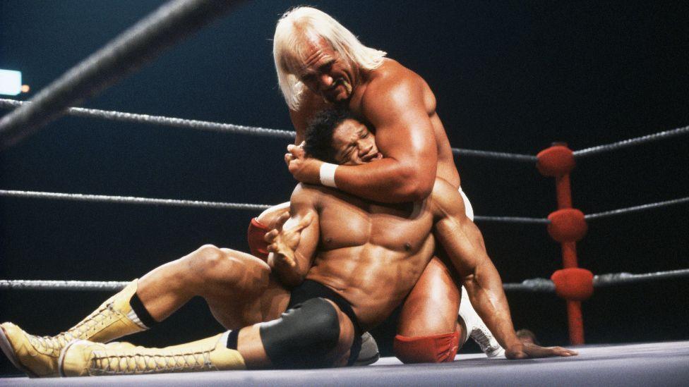 Hulk Hogan Holding Tony Atlas in a Headlock in the wrestling ring in 1981