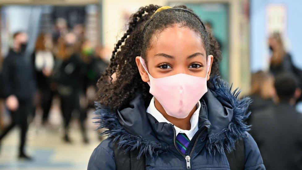 School child wearing mask