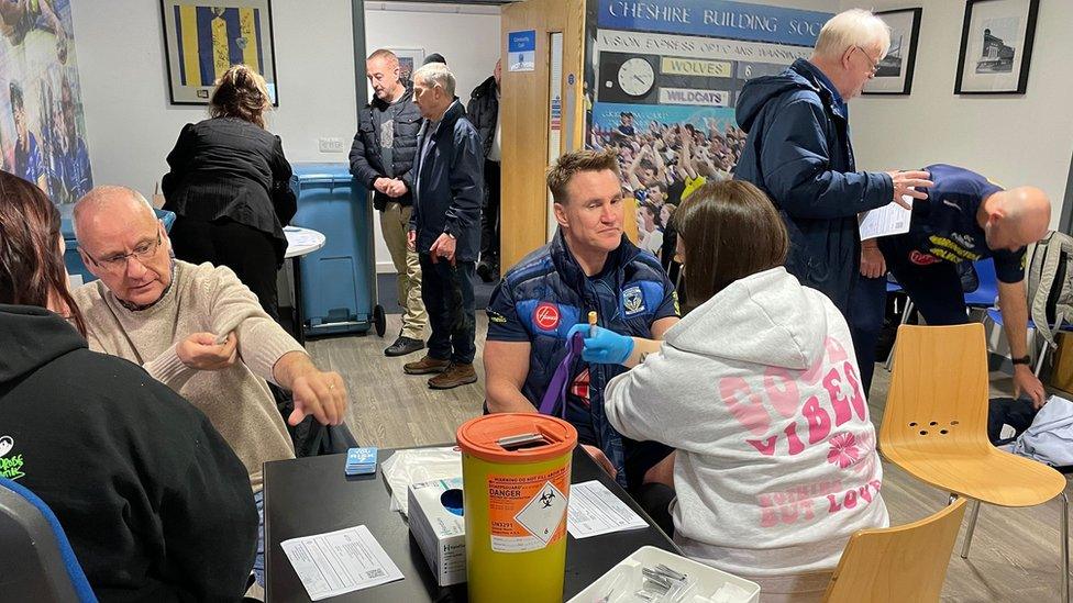 men getting tested at stadium