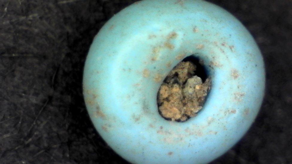 Photo of a ceramic faience jewellery bead found at Priory Street