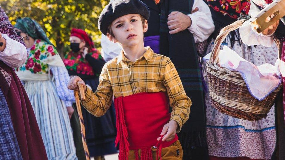 Young boy dressed in traditional Spanish costume