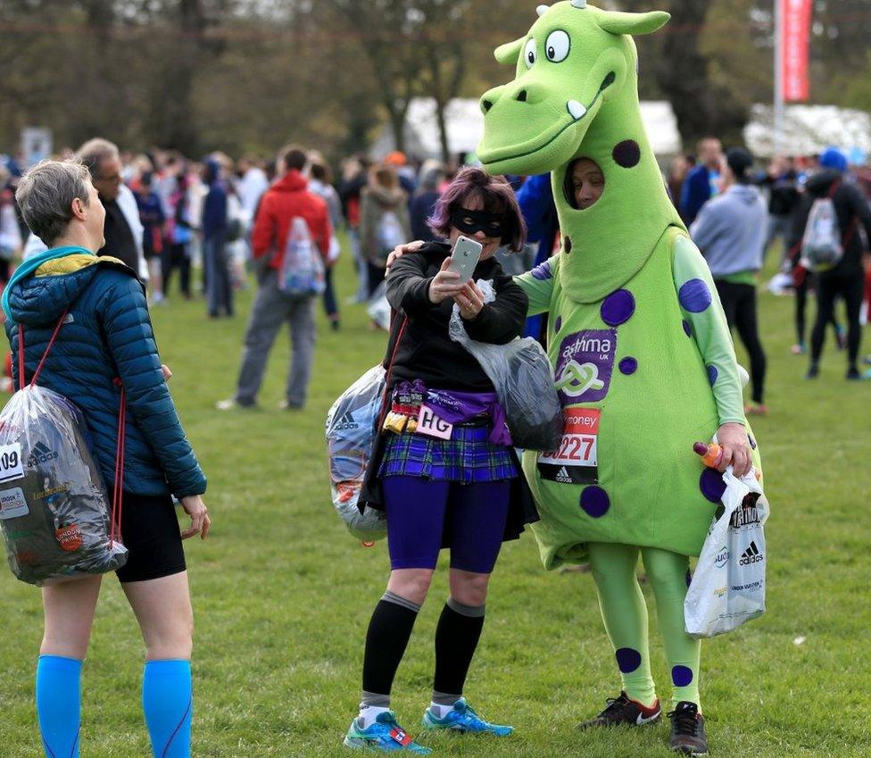 Fancy dress competitors take a selfie before the race