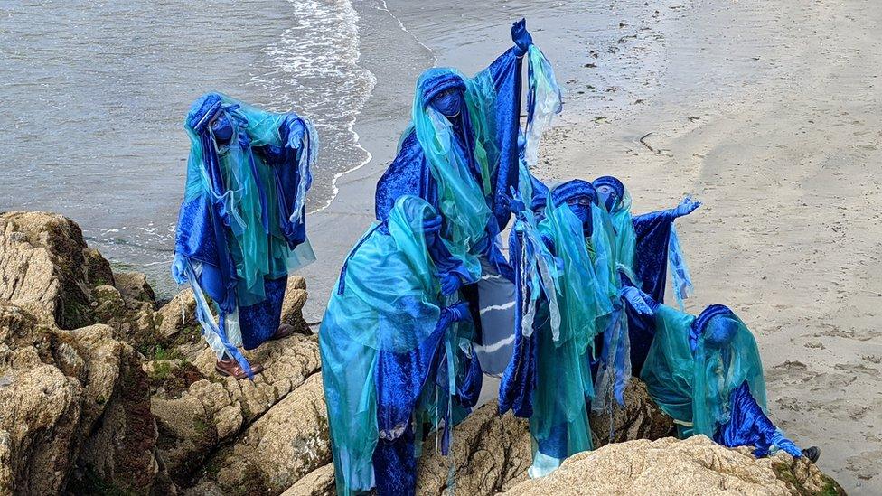 Protesters on a beach