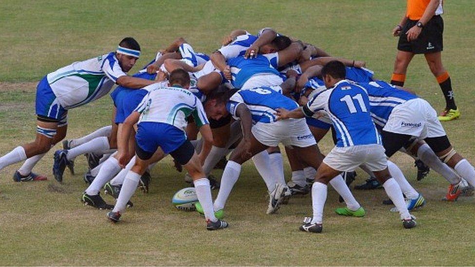 The India national rugby team, in blue, play Uzbekistan during the Asian 5 Nations div lll West Rugby Championship