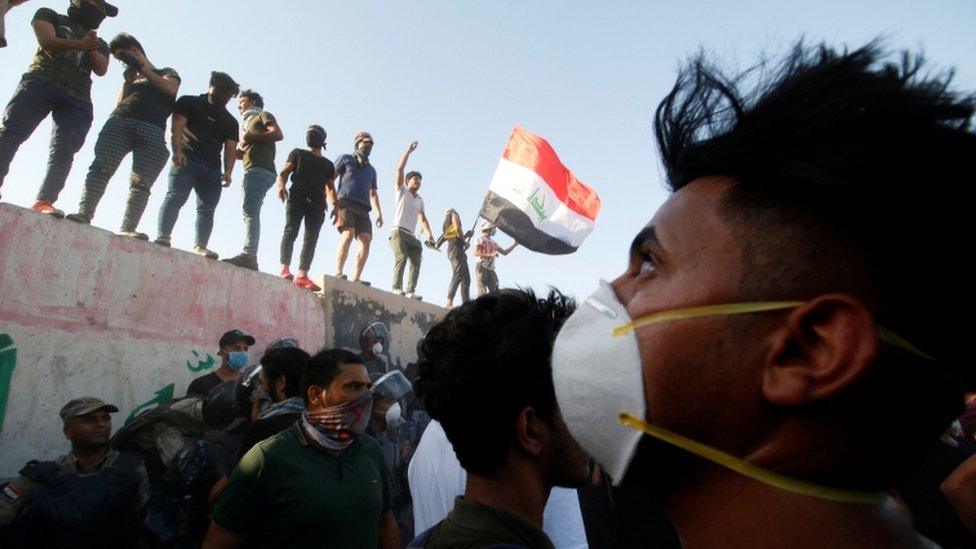 Protesters at a government building in Basra