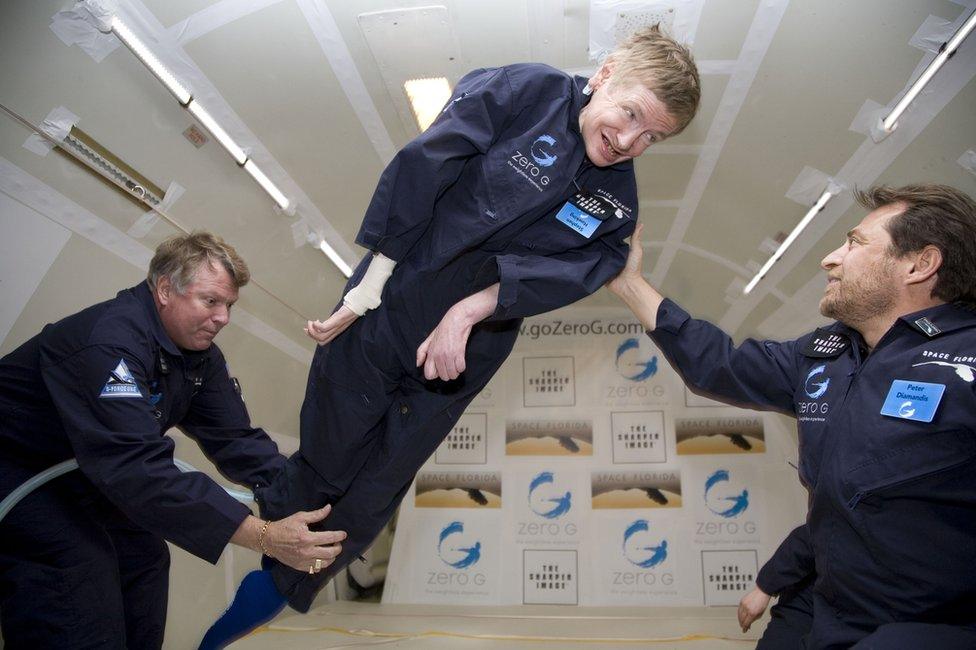 Stephen Hawking floats as he experiences zero gravity