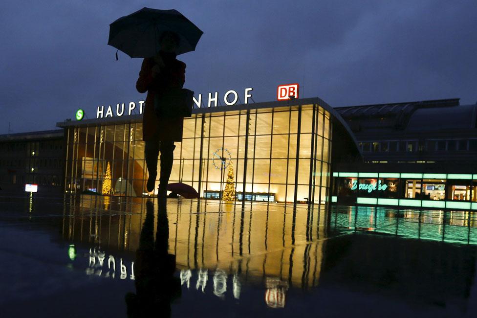 A woman outside the Cologne station