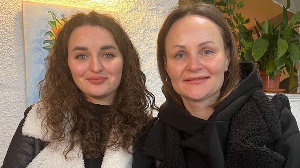 Hanna and Svitlana sitting with coffee in Lena's Ukrainian Kitchen in Hull city centre